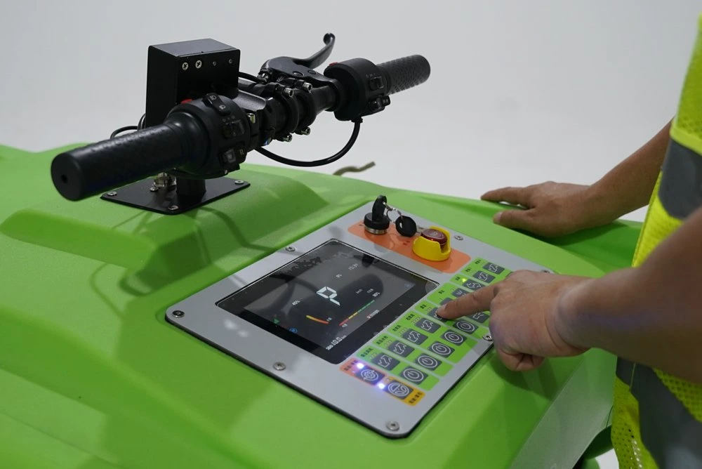 A close view of the physical panel shows how the display and function buttons sit within reach of the operator.